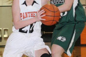 Sarah Brown goes to the hoop for the Washougal High School girls basketball team. The Panthers nailed nine 3-pointers Friday night, but the Woodland Beavers prevailed 59-48.