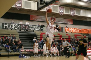 Jacob Kaler glides to the hoop to score two of his 35 points Jan. 25, at Camas High School. The Papermakers beat Hudson's Bay 84-57 to take over first place.