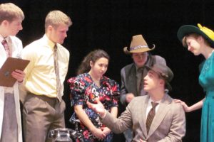 Far right, Veta Louise Simmons (Robyn Pfeifer) implores her brother,  Elwood P. Dowd (Austin Lindsey), to please take medication so that he will quit seeing Harvey, a large imaginary rabbit, everywhere he goes.