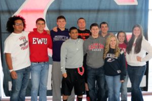 Ten Camas High School seniors participated in National College Signing Day. Pictured in the back row (left to right): Jason Vailea, Reilly Hennessey, Dylan White, Drew Clarkson, Blake Christopher, Teylen Sheesely and Harli Hubbard; front row (left to right): Jorden Payne, Zach Eagle and Lena Richards.