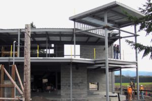 Employees from RSV Building Solutions and Nutter Corporation are working on the roofing and parking lot sub grading at the future site of the Black Pearl on the Columbia. The restaurant, located at the former site of the Parker House, 56 S. "A" St., Washougal, is expected to open this year. Jerry Heikkila (not pictured), with RSV, is the project superintendent.