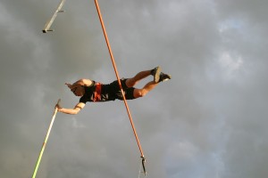 Brendan Casey soars over the bar set at 14 feet, 6 inches to become the new school record holder in the pole vault.