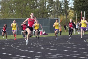 Camas senior Megan Kelley leaves the competition in a daze during the 200-meter dash May 3, at Columbia River High School. She also finished first in the 100, 400 and the long jump.