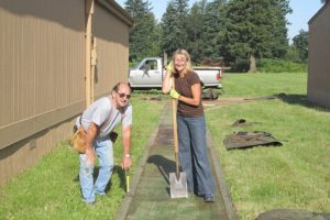 New Washougal School District Superintendent Dawn Tarzian spent a recent afternoon with maintenance department members Bob Widner (pictured) and Al Seaman, making improvements to Jemtegaard Middle School.