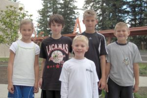 The following Grass Valley Elementary students recently hit the 100-mile mark for the school jogging program, which just finished its seventh week. They include fourth-grader Rachel Blair, fifth-grader Patrick Upkes, fifth-grader Will Schultz and second-grader Cole Kendall. Not pictured is second-grader Abby Sherwood, who was also the school champion last year for girls.