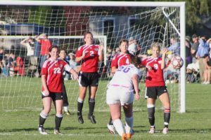 Camas soccer players Janae Benson, Andy Soderberg, Raya Klein, Adrienne Engel and Annike Sumpter (left to right) fend off a free kick by Columbia River. The Papermakers beat the Chieftains 1-0 Oct. 19, at Jason Lee Middle School in Hazel Dell.