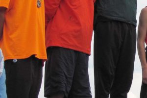 Washougal High School senior runner Dylan Croeni (center) stands on the podium in second place at state Saturday, in Pasco.