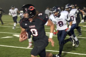 Addison Owen (9)  was all over the field for the Camas football team Saturday. He scored a touchdown on the first series of the game, blocked an extra-point kick on defense, filled in at running back, threw a pass, caught a couple of them and returned kick offs for several yards.