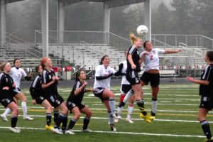 Raya Klein (2) and a Bonney Lake Panther go head-to-head for the soccer ball.