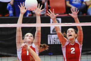 Sydney Schwartz and Kelsy Benton (left to right) attack the net for the Camas volleyball team at the Toyota Center in Kennewick. The 30-2 Papermakers placed fifth at state, and finished with the best record in school history.