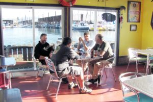 The dining area of The Puffin Cafe, in Washougal, features views of the Port of Camas-Washougal marina and the Columbia River. The waterfront restaurant, which has Treasure Island Salad, Barbados fish tacos and Buccaneer Burgers. is included in the "101 Things to Do in Camas & Washougal" list created by the C-W Chamber of Commerce.