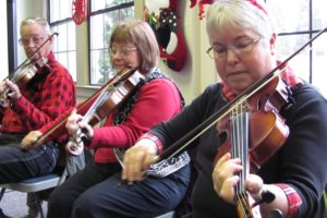 Dawn Feldhaus/Post-Record
Harry Vandervender, Chlovena Byrd and Judy Muzzy (left to right) recently performed at the Camas Community Center. As members of the Old Time Fiddlers, they also play alongside guitarists and vocalists at area nursing and retirement homes, and the Clark and Skamania county fairs.