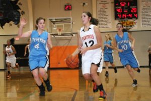 Kendall Utter drives to the hoop for two of her 16 points in the third quarter Wednesday night, at Washougal High School. She finished with 23 points.