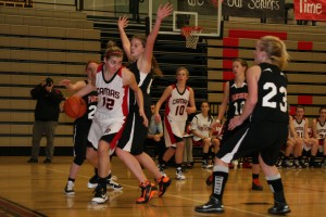 Camas High School senior Melissa Williams drives by Washougal High School senior Chandler Audette.