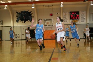 Kendall Utter drives to the hoop for two of her 16 points in the third quarter Wednesday night, at Washougal High School.