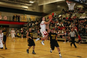 Addison Owen nets two points for the Papermakers, who beat Hudson's Bay 84-57 Tuesday at Camas High School.