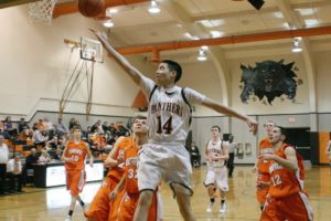 WHS sophomore Austin Tran (14) has been a bright point in the Panthers' recent string of losses, after starting the season with eight consecutive wins. Against Kennewick on Friday, he scored a team high 9 points, and against Centralia the night before he scored a career high 18 points.