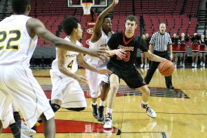 Trevor Jasinsky drives toward the basket during a game held at the Moda Center in Portland against Columbia Christian of Portland. The Papermaker had 10 points in what ended in a loss for Camas, 76-50.  View additional photos at www.camaspostrecord.com.