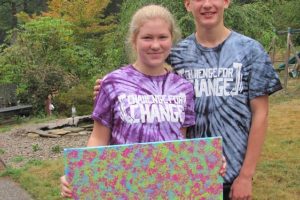 Post-Record file photo
Chloe and Carson Connors hold a painting she created, called "Hope," which was sold in a silent auction to raise money for the Teen Challenge Metro Men's Center. The two hosted a "Challenge for Change," event in honor of their brother, who overcame a heroin addiction.