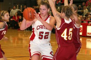 Jenka Stiasna (52) is surrounded by Prairie Falcons Saturday, at Camas High School. The junior scored 14 points and grabbed 9 rebounds for Camas.