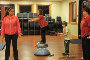 Anna Stephens demonstrates how to correctly do rows, which can help strengthen the back and triceps muscles.