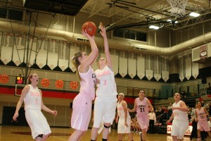 Sierra Brown shoots over the outstretched hand of a Mountain View defender during the Hoops 4 Pink game Friday, at Camas High School. The Papermakers beat the Thunder 49-35.