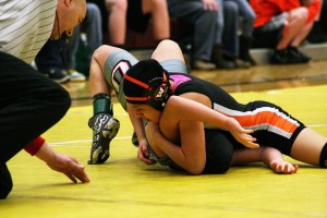 Washougal's Yaneli Martinez pins Union's Isabelle Morales for the Clark County 105-pound championship medal Saturday, at Prairie High School. Eight Washougal girls wrestled in the finals to help the Panthers win the meet by 77 points.