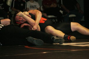 Brandon McKee pinned Dillon Miller to give the Washougal High School wrestling team the lead for good Friday. The Panthers defeated the Lumberjacks 44-30 to capture the 2A Greater St. Helens League championship.