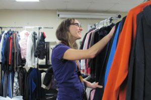 Julie Bristol, Jemtegaard Middle School social worker, organizes donations in the clothing closet. Currently, the closet is in need of tennis shoes, boys clothes and plus-size girls and juniors clothing.