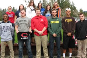 Twelve Papermakers participated in National College Signing Day Wednesday, at Camas High School. Front row (left to right): Isaiah Ephraim (Eastern Oregon University), Alex Walker (Central Washington University), Tanner Aldridge (Southern Oregon University), McKinley LeFore (University of Oregon), James Price (University of Wyoming) and Brett Ball (Bellevue College). Back row (left to right): Victoria O'Neill (Clackamas Community College), Katie Schroeder (Utah State University), Nicole Corbett (Western Washington University), Jordan Bethune (Montana State University-Billings), Maddison Neely (Western Nevada College) and Alissa Pudlitzke (Boise State University).