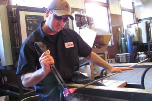 Josh Hancock, of Washougal, creates glass roses at Firehouse Glass, a studio in downtown Vancouver. He has been a glass blower for 12 years. "I love it. That's why I stuck with it," Hancock said. "I can't imagine doing anything else that would be enjoyable."