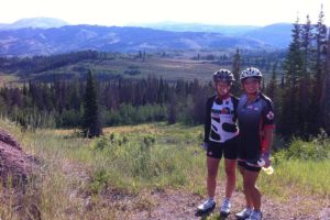 Sondra Grable and Christy Quinn pose for a photo during the Tour de Wyoming cycling event last summer, shortly before Quinn was severely injured in a freak accident.