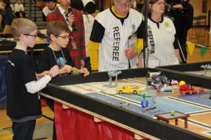 The Camas Mechanickidz took home first- and second-place finishes at a recent state tournament. Here, team members Tate Perry and Owen Wilks focus on a task.