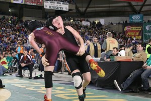 Washougal sophomore Erin Locke sets Lakewood's Allison Lawton up for a rough landing Friday, during the 2A state wrestling tournament at the Tacoma Dome. Locke brought home an eighth-place medal.