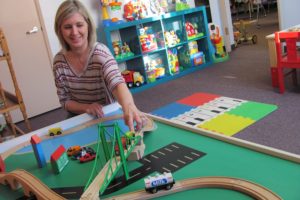 A play area for children at 4Ever Growing Kids includes toys and a flat screen TV with a DVD player. Store owner Amy Jo Begley (pictured), a mother of two, opened the new business in downtown Camas in November 2013. The consignment boutique sells maternity clothing, as well as outfits for babies and children, toys, books, equipment and accessories.