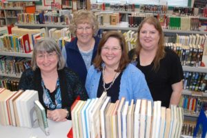 Contributed photo
Washougal elementary school librarians are happiest when surrounded by books.  They are (back row, left to right): Marlene Leifsen and Tammy Asbjornsen, (front row, left to right): Holly Vonderohe and Kathy Stanton.