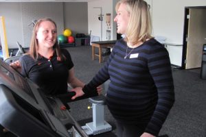 Clinic Director Lindsy Palisca observes Front Office Coordinator Jessica Groff walk on a treadmill at Therapeutic Associates Physical Therapy -- Camas. The new location provides athletic screens, orthopaedic and sports rehabilitation, performance training, physical fitness exams and work kinetics. Palisca specializes in ASTYM, manual therapy, running/footwear analysis, vestibular disorders, Temporomandibular Dysfunction and migraines.