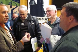 Clark County Commissioner David Madore (left) talked with Jim Ashley (right) after the Washougal City Council Town Hall Saturday morning. Discussions regarding the proposed Columbia River Crossing (I-5 replacement bridge) attracted more than 40 people to City Hall. Madore spoke in opposition to the CRC project.