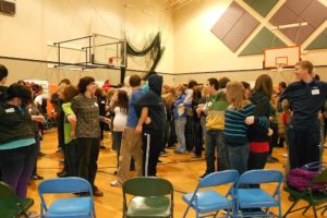 Participants in Challenge Day take part in an icebreaker activity. The event included more than 100 students from Excelsior and Washougal high schools, as well as teachers, administrators and community members.