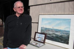 Bob Peake, of Washougal, has a print of the USS Dixie  -- one of the ships he served on while in the Navy during the Korean War. He also has two framed pieces of wire fence previously located in the Demilitarized Zone between North and South Korea.