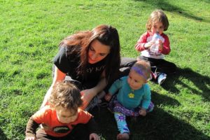 Elizabeth Soth holds Paul Garrett, 14 months, while her daughter, Isla, 9 months and son, William, 3, look on. Soth and her children visit Heritage Park regularly. Garrett was there with his father, Kelly, not pictured.