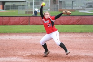 Sarah Nidick winds up a pitch for the Papermakers in the rain Monday, at Camas High School. The senior held Evergreen to two hits in five innings.