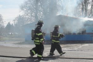 Firefighters make final preparations for the controlled burn of the former Riverside Bowl building in Camas along Northeast Third Avenue. The facility was originally built in 1947, and when it was destroyed on Saturday it was one of the largest practice burns in Camas history with smoke visible from several miles away. Personnel from the Camas and Washougal fire departments and  East County Fire and Rescue participated in the training exercise. The fire was still smoldering Monday morning, 48 hours after it began.