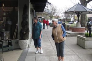 Annice Sampson (left) and Edith Arndt (right) admire the windows of Camas Antiques, next to the Liberty Theatre. The longtime friends walk together four days a week through their Camas neighborhood and into the downtown business core. "It starts the day out right for me," Arndt said.