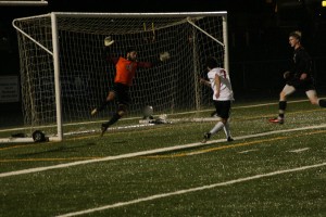 Josiah Pacheco chips in the goal that helps Camas beat Union 2-1.