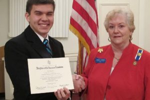 Washougal High School senior David Choi stands with Evelyn Campbell, regent of the Fort Vancouver Chapter of the Daughters of the American Revolution to receive his "Good Citizen Award."