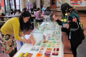 Attendees at the 2014 Japanese Cultural Festival peruse some of the displays in the commons at Washougal High School. This year's festival will be held from 11 a.m. to 3:30 p.m. Saturday, April 25.