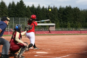 Mikaela Searight crushes the softball over the left field fence for a 2-run home run. The Camas senior added a triple, double and a single to hit for the cycle in a 10-9 victory for the Papermakers over the Prairie Falcons Friday, at Camas High School.