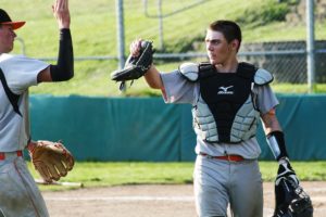 Brandon Casteel (right) gives Ryan Krout (left) a high-five after the Panthers defeated Mark Morris 6-5.