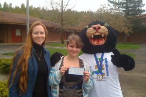 The 2012 Student Stride for Education will be Saturday, May 19. Pictured above (left to right) are Stride Director Stephanie Eakins, Jemtegaard Middle School student Tessa Walcott, winner of the 2012 Stride logo contest, and the Stride cat.